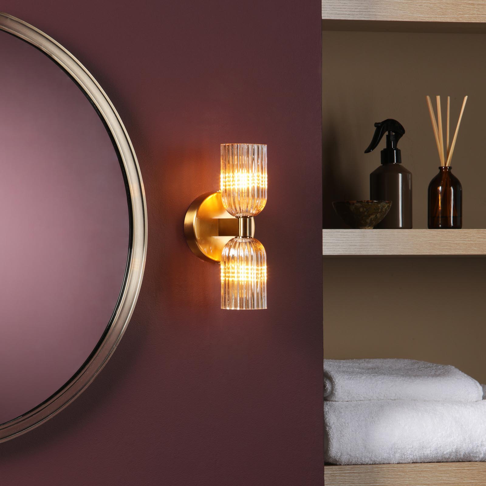 Hilaria 2 Light Bathroom Wall Light Antique Gold and Amber Ribbed Glass IP44