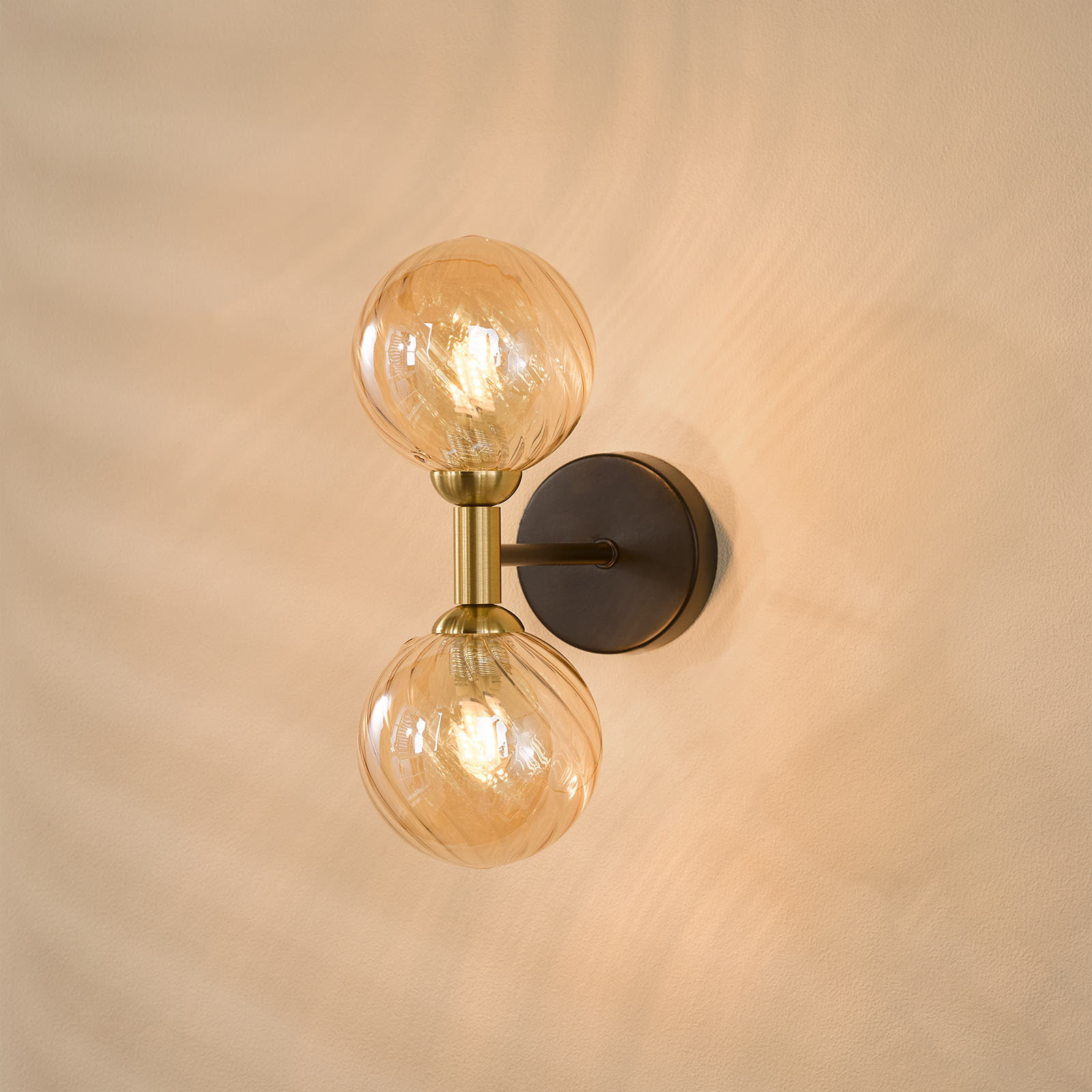 Takara 2 Light Wall Light Matt Black and Bronze With Twisted Amber Glass