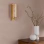 Bevin Bathroom Wall Light Natural Brass and Amber Ribbed Glass IP44
