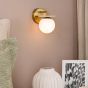 Inaya Wall Light Natural Brass and Travertine 