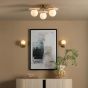 Inaya Wall Light Natural Brass and Travertine 