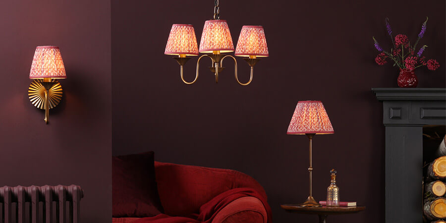 Cottagecore living room with pendent ceiling wall, wall light and table lamp with floral print lamp shade 