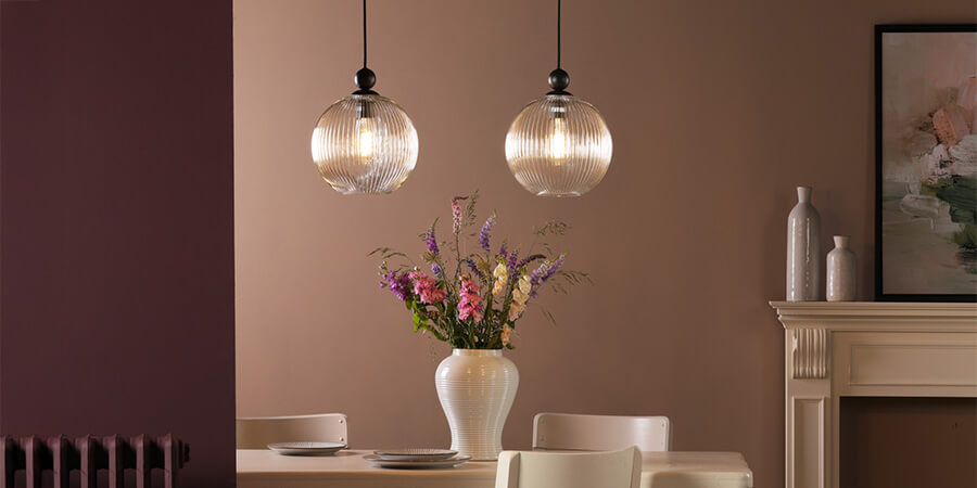 Modern looking living room with ribbed glass pendant ceiling lights